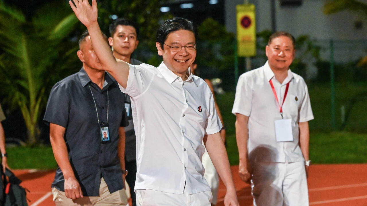 singapore s prime minister lawrence wong of the people s action party pap arrives at the party s gathering awaiting the vote count for the general election in singapore on may 3 2025 photo afp singapore s prime minister lawrence wong of the people s action party pap arrives at the party s gathering awaiting the vote count for the general election in singapore on may 3 2025 photo afp