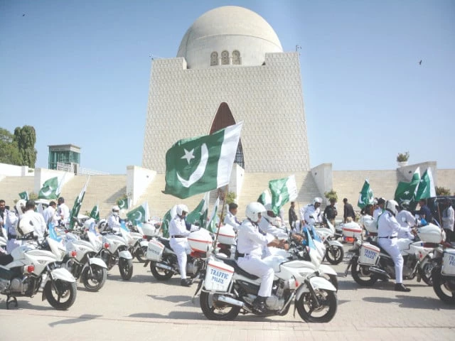 roaring engines waving flags traffic police inspectors ride in style paying tribute to pakistan s bravery on yaum e tashakkur photo jalal qureshi express roaring engines waving flags traffic police inspectors ride in style paying tribute to pakistan s bravery on yaum e tashakkur photo jalal qureshi express