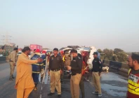the passenger van first hit an oil tanker and then crushed to a cargo trailer photo sindh police x account