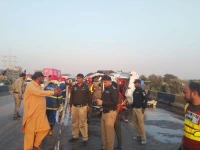 the passenger van first hit an oil tanker and then crushed to a cargo trailer photo sindh police x account the passenger van first hit an oil tanker and then crushed to a cargo trailer photo sindh police x account