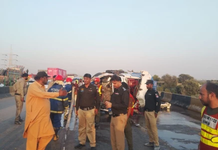 the passenger van first hit an oil tanker and then crushed to a cargo trailer photo sindh police x account
