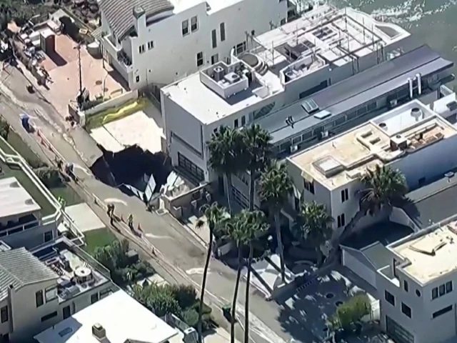 evacuations in la neighbourhood after waves open sinkhole evacuations in la neighbourhood after waves open sinkhole