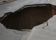 three motorbikes fall into sinkhole