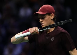jannik sinner reacts as he plays against zizou bergs during their men s singles match on day three of the paris atp masters 1000 tennis tournament at the paris la d fense arena in nanterre photo afp