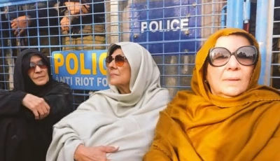sisters of pti chief imran khan sit outside adiala jail after a meeting was denied on tuesday photo x pti