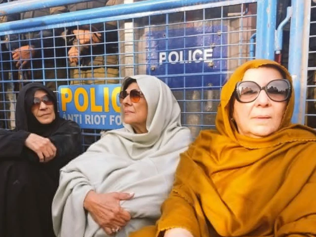 sisters of pti chief imran khan sit outside adiala jail after a meeting was denied on tuesday photo x pti sisters of pti chief imran khan sit outside adiala jail after a meeting was denied on tuesday photo x pti