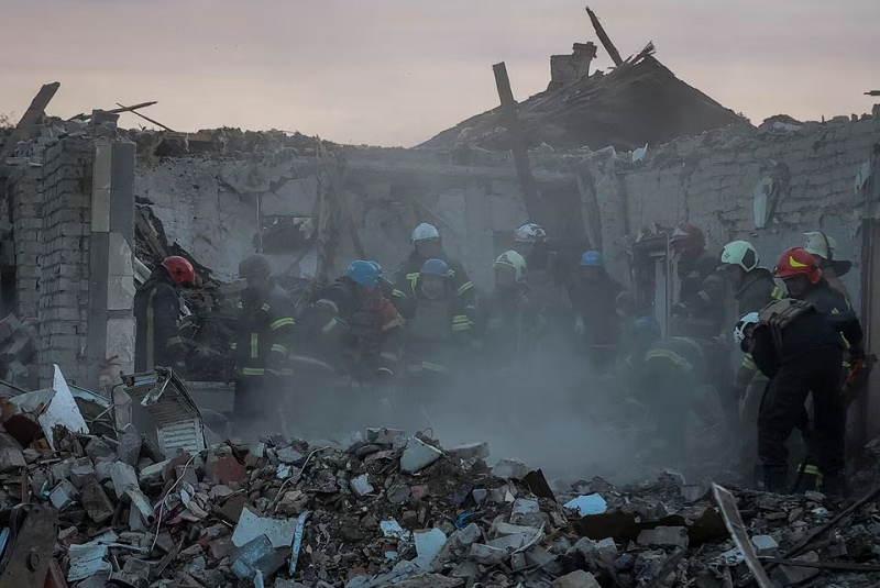 rescuers work at a site of a russian military strike in the village of hroza in kharkiv region ukraine october 5 2023 photo reuters