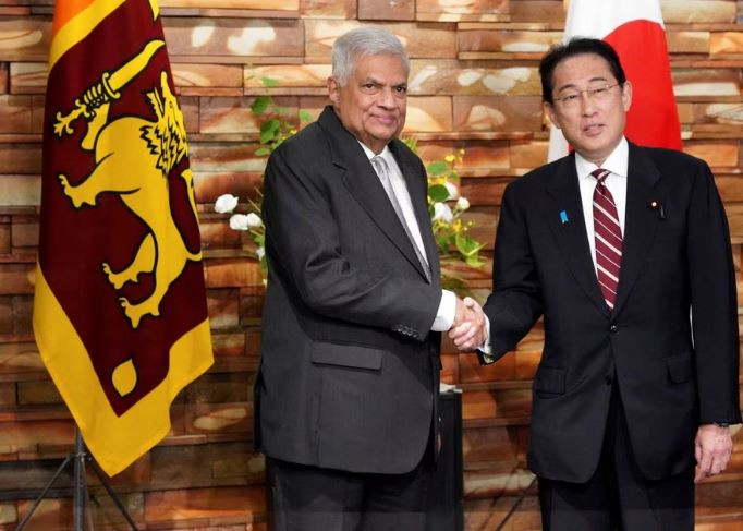 sri lankan president ranil wickremesinghe and japanese prime minister fumio kishida shake hands before their meeting at the prime minister s office thursday may 25 2023 in tokyo photo reuters