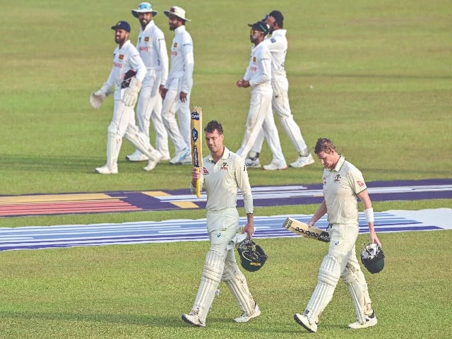 australia s alex carey c acknowledges the crowd as he and captain steve smith r walk back to the pavilion at the end of the second day of the second test against sri lanka at galle photo afp australia s alex carey c acknowledges the crowd as he and captain steve smith r walk back to the pavilion at the end of the second day of the second test against sri lanka at galle photo afp