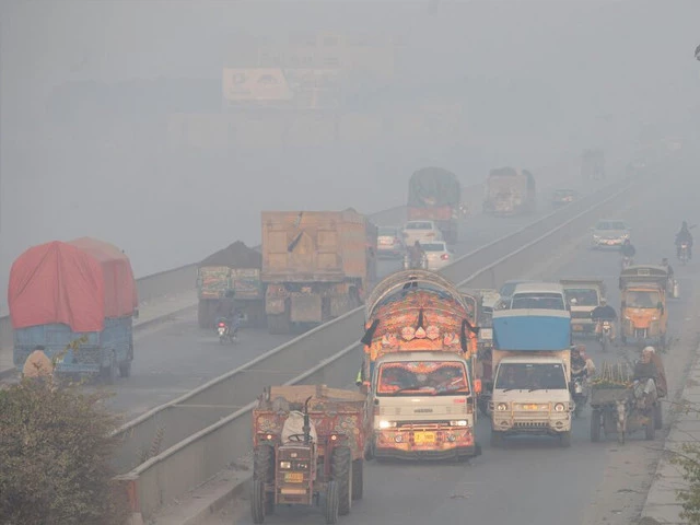vehicles move amid dense smog in lahore on november 24 2021 photo reuters