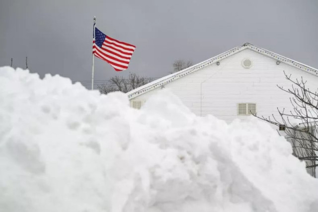 the flag flies over the lawrence athletic club in front of a mountain of snow after a record snowfall left over 3 feet on the ground on december 2 2024 in erie pennsylvania five states are currently under winter storm warnings or advisories from the nws photo getty images the flag flies over the lawrence athletic club in front of a mountain of snow after a record snowfall left over 3 feet on the ground on december 2 2024 in erie pennsylvania five states are currently under winter storm warnings or advisories from the nws photo getty images