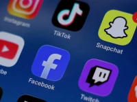 nstagram tiktok snapchat youtube facebook twitch and reddit applications are displayed on a mobile phone in this picture illustration taken on december 9 2025 reuters
