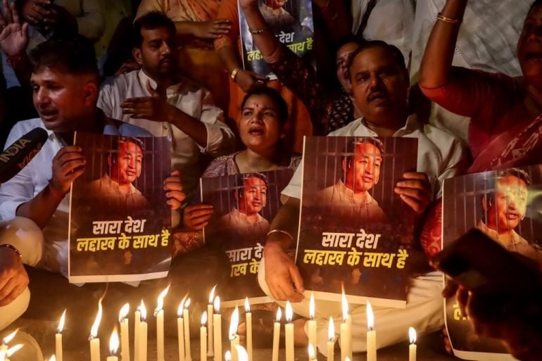 Supporters take part in a candlelight vigil protesting against the arrest of climate activist Sonam Wangchuk, at Jantar Mantar in New Delhi on September 26, 2025. PHOTO: AFP