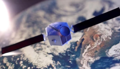 a satellite model is placed on a picture of earth in this illustration taken november 25 2024 photo reuters