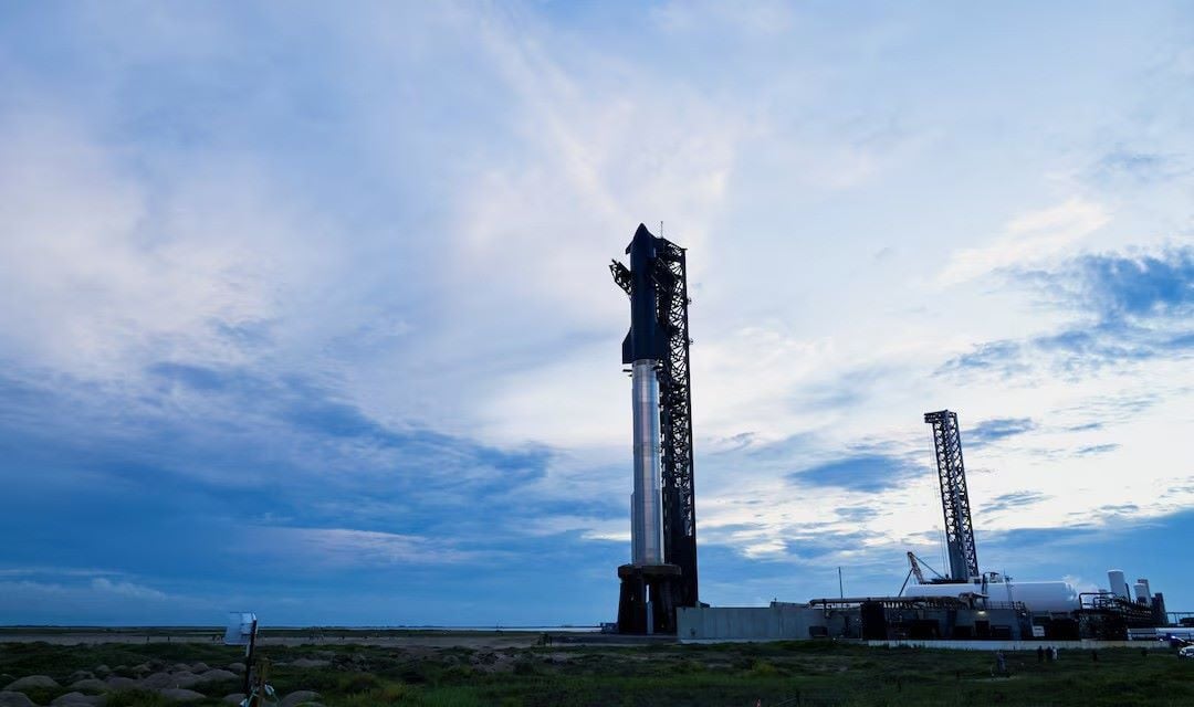 The SpaceX Starship spacecraft is hoisted along the launch tower for stacking atop the heavy booster in preparation for its 10th test flight from the company's complex in Starbase, Texas, US, August 23, 2025.PHOTO: REUTERS
