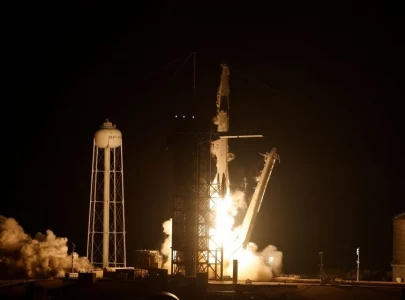 spacex rocket carries multinational crew toward space station