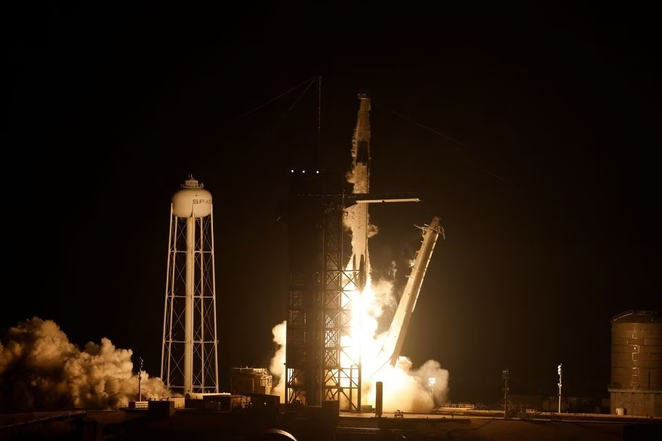 Photo of SpaceX rocket carries multinational crew toward space station