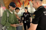 spanish national police officers check the documents of travellers arriving from italy after spain s government said it would establish border controls for flights and ships from italy until september 7 in a dispute over irregular migration at madrid barajas airport in madrid spain august 8 2026 photo reuters