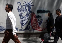 people walk past an anti us mural on a street in tehran iran june 1 reuters people walk past an anti us mural on a street in tehran iran june 1 reuters
