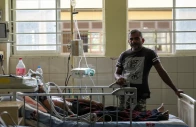 a dengue patient lies on the hospital bed while his son stands next to him at district general hospital in negombo sri lanka july 16 2026 photo reuters