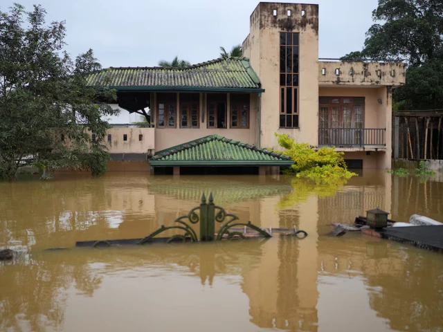 a house partially submerged by floods stands in an area affected by flood following heavy rainfall in malwana sri lanka november 29 2025 photo reuters a house partially submerged by floods stands in an area affected by flood following heavy rainfall in malwana sri lanka november 29 2025 photo reuters