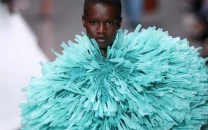 raffia dresses and feathery gowns shine in stella mccartney s show in paris raffia dresses and feathery gowns shine in stella mccartney s show in paris