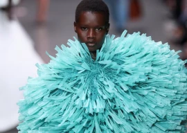 raffia dresses and feathery gowns shine in stella mccartney s show in paris raffia dresses and feathery gowns shine in stella mccartney s show in paris
