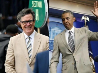 stephen colbert revives barack obama s tan suit controversy at presidential centre opening