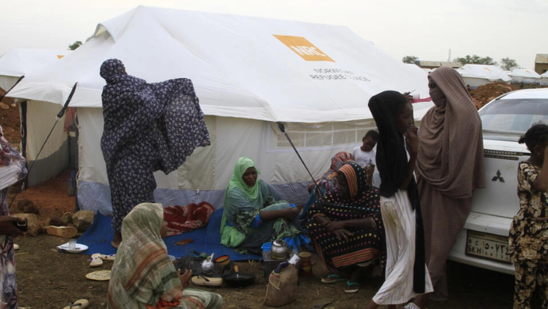 women and children outside their tent at a camp for internally displaced at gedaref in east sudan photo afp