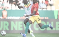 sudan hold senegal and stay top