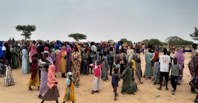 sudanese people who fled the violence in their country and newly arrived wait to be registered at the camp near the border between sudan and chad in adre chad april 26 2023 reuters file photo sudanese people who fled the violence in their country and newly arrived wait to be registered at the camp near the border between sudan and chad in adre chad april 26 2023 reuters file photo