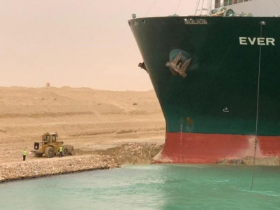 ship stuck in suez like a beached whale firm aiming to free it