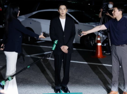 bts suga shows up for police questioning speaks to k media