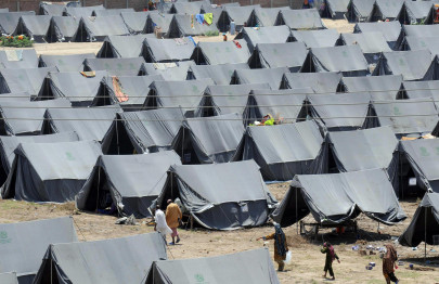 sudden relief bemuses displaced villagers