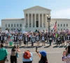 demonstrators hold letters making up the slogan born in the usa citizen outside the u s supreme court building as the court hears oral arguments on the legality of the trump administration s effort to limit birthright citizenship for the children of immigrants in washington dc us april 1 2026 reuters