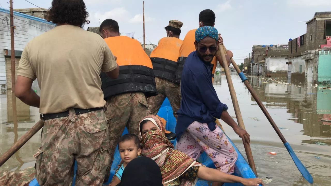 families moving to safer place a ayub goth surjani town has submerged in rain water after heavily downpour in the city photo app families moving to safer place a ayub goth surjani town has submerged in rain water after heavily downpour in the city photo app