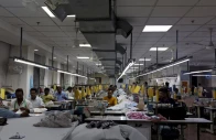 garment workers stitch clothes at a textile factory in noida india july 31 2025 reuters