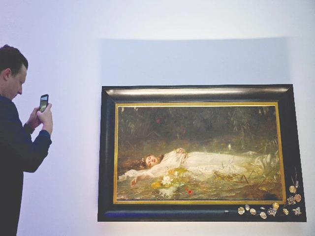painting ophelia hung inside the museum in wiesbaden western germany photo afp painting ophelia hung inside the museum in wiesbaden western germany photo afp
