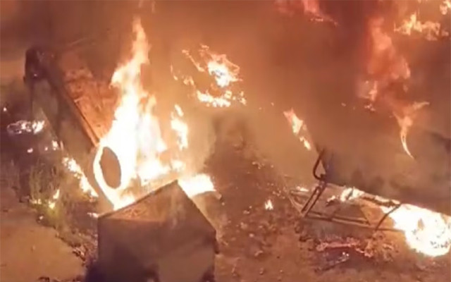 a mob beat the man to death on thursday night after accusing him of burning pages of the holy quran they set the police station in the area ablaze and injured eight policemen screengrab