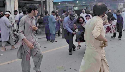 terror attack people evacuate an injured victim after a suicide bombing in swat photo afp