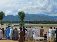 residents gather after tourists who were on a picnic were swept away by overflowing floodwaters in the swat river in swat valley in pakistan june 27 2025 photo reuters file