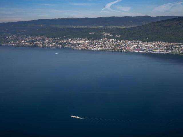 neuchatel is at the foot of the jura mountains in northwestern switzerland photo afp