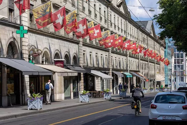 swiss and canton de geneve flags are seen in geneva switzerland june 7 2023 photo reuters swiss and canton de geneve flags are seen in geneva switzerland june 7 2023 photo reuters