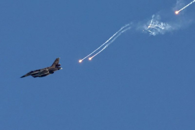 an israeli jet launching missiles photo reuters an israeli jet launching missiles photo reuters