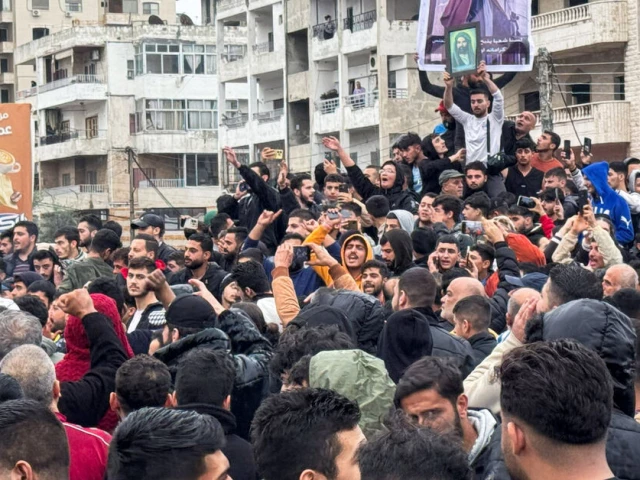 alawites gather during a protest to demand federalism and the release of detained members of their community in latakia syria november 25 2025 photo reuters