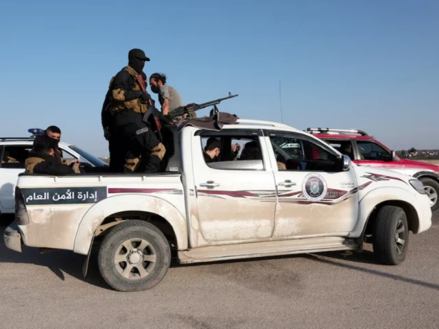 syrian army personnel travel in a military vehicle as they head towards latakia to join the fight against the fighters linked to syria s ousted leader bashar al assad in aleppo syria march 7 2025 photo reuters syrian army personnel travel in a military vehicle as they head towards latakia to join the fight against the fighters linked to syria s ousted leader bashar al assad in aleppo syria march 7 2025 photo reuters