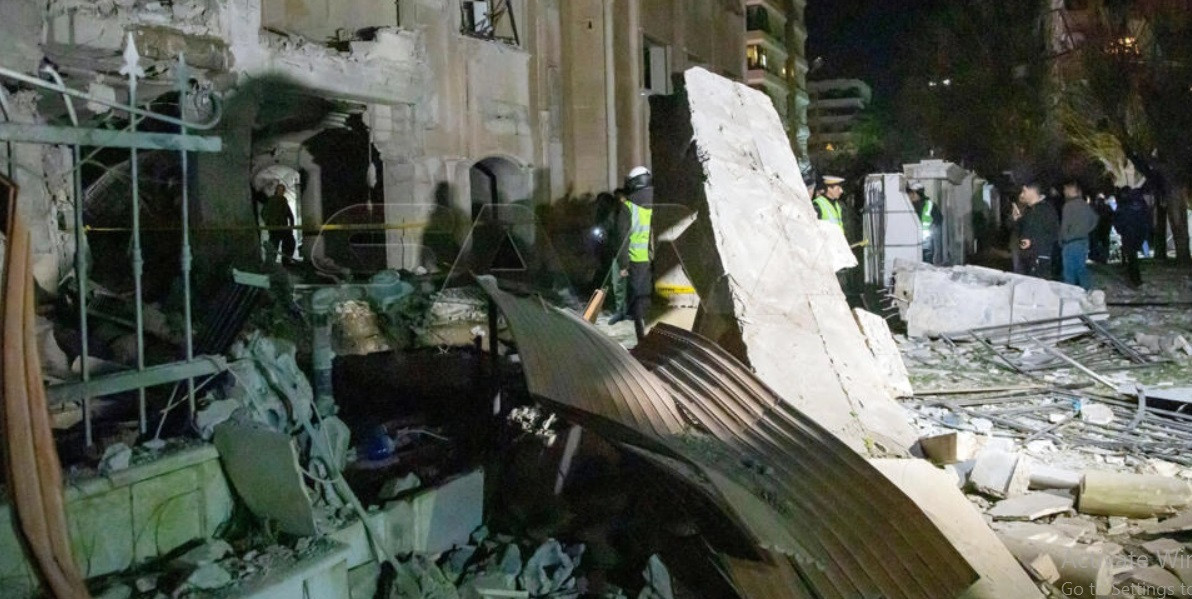 a handout picture taken and released on february 19 2023 by the official syrian arab news agency sana shows a damaged building following an israeli missile strike where 15 people were killed in damascus agence de presse syrienne sana afp