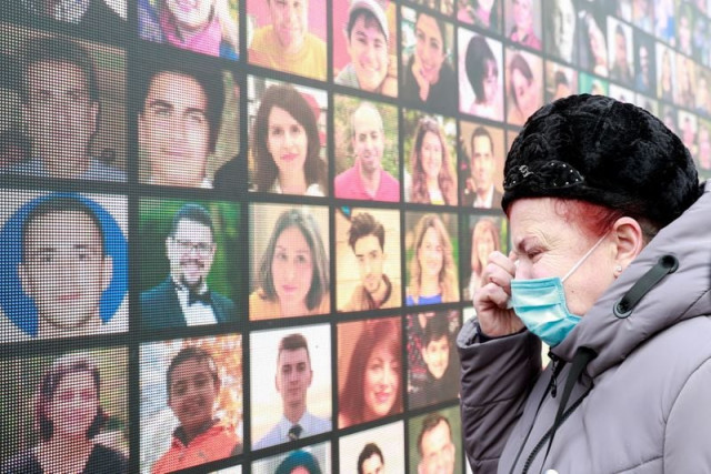 a victim s relative mourns during a commemorative ceremony which marks the first anniversary of the ukraine international airlines flight ps752 downing in iranian airspace in kyiv ukraine january 8 2021 reuters a victim s relative mourns during a commemorative ceremony which marks the first anniversary of the ukraine international airlines flight ps752 downing in iranian airspace in kyiv ukraine january 8 2021 reuters