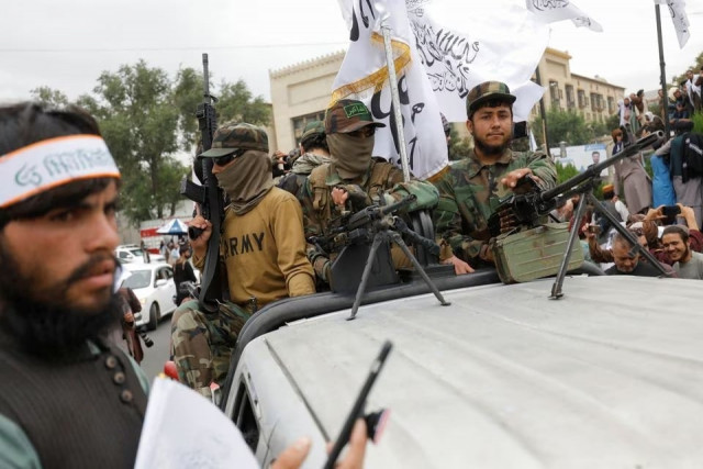 taliban fighters rejoice on the first anniversary of the fall of kabul on a street in kabul afghanistan august 15 2022 photo reuters taliban fighters rejoice on the first anniversary of the fall of kabul on a street in kabul afghanistan august 15 2022 photo reuters