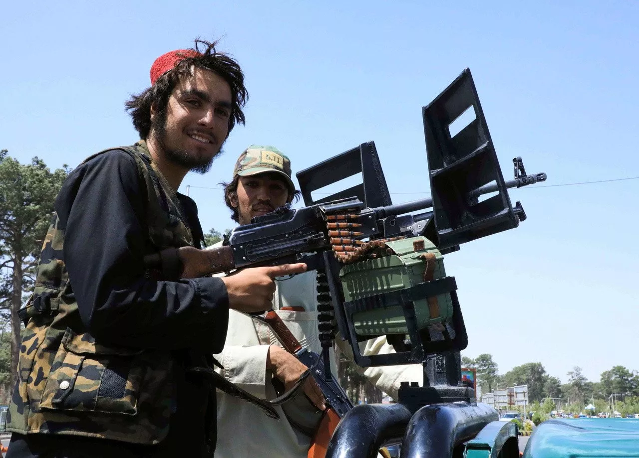taliban forces patrol a street in herat photo reuters taliban forces patrol a street in herat photo reuters